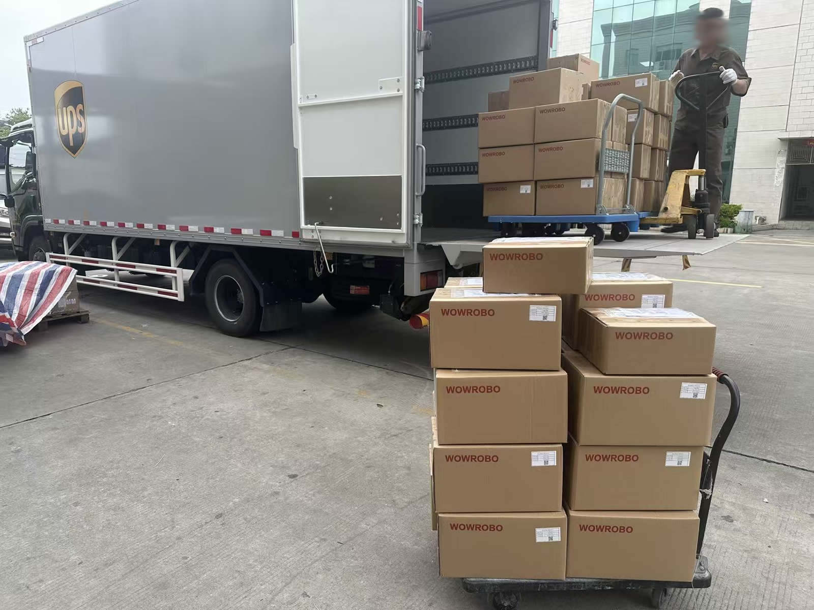 WowRobo cartons being loaded for outbound shipment